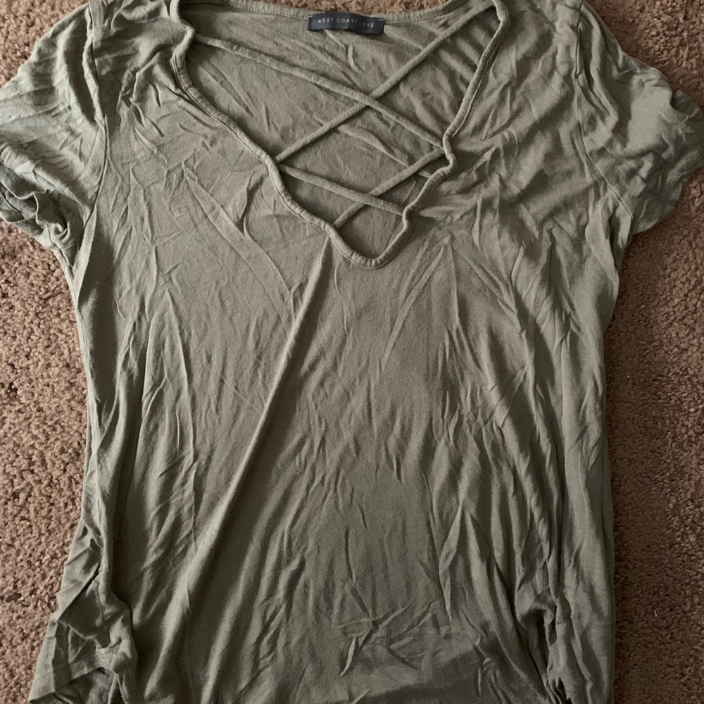 short sleeve green blouse sort of shirt.